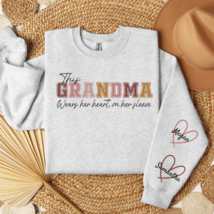 This Grandma Wears Her Heart on Her Sleeve – Personalized Sweatshirt